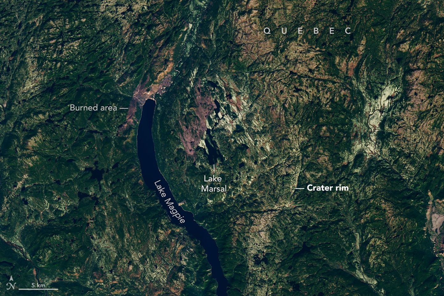 Landsat satellite image of Lake Marsal and the Uhackatik impact structure in Quebec.